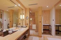 a bathroom with a large sink and a shower at ITC Grand Chola, a Luxury Collection Hotel, Chennai in Chennai