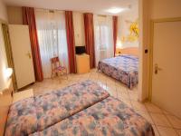 Posteľ alebo postele v izbe v ubytovaní Hotel Sileoni