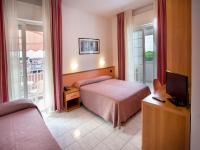 Posteľ alebo postele v izbe v ubytovaní Hotel Sileoni