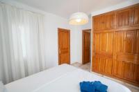 A bed or beds in a room at RESIDENSOL 13 MENYBER