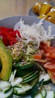 a plate of food with vegetables on a table at La divina trinidad - Galeria Wellness Hostal in Cali
