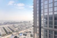 Nespecifikovaný výhled na destinaci Dubaj nebo výhled na město při pohledu z apartmánu