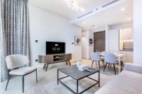 TV a/nebo společenská místnost v ubytování STAY BY LATINEM Luxury 1BR Holiday Home CV A2811 near Burj Khalifa
