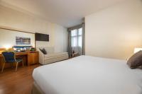 Łóżko lub łóżka w pokoju w obiekcie iH Hotels Milano Eur - Trezzano sul Naviglio