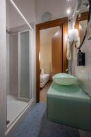 Łóżko lub łóżka w pokoju w obiekcie iH Hotels Milano Eur - Trezzano sul Naviglio