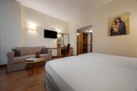 Telewizja i/lub zestaw kina domowego w obiekcie iH Hotels Milano Eur - Trezzano sul Naviglio