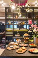 a table with different types of food on it at See Side Hotel SEEWIRT MATTSEE in Mattsee