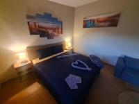 Postel nebo postele na pokoji v ubytování Casa Gran Vista de Alora