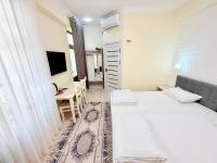 Samarkand Travelにあるベッド