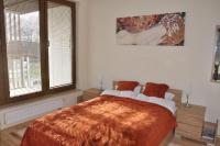 Posteľ alebo postele v izbe v ubytovaní Olympic Park Apartment