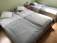 Posteľ alebo postele v izbe v ubytovaní APARTAMENTY-STUDIO noclegi wczasy wakacje ferie - pobyty rodzinne