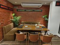 Posezení v ubytování Sylhet Paradise Inn