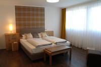 Postel nebo postele na pokoji v ubytování Landidyll Hotel zum Freden