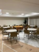 En restaurant eller et andet spisested på Guarajuba - Paraiso dos Coqueiros BA