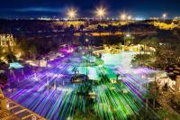 an aerial view of a fountain at night at Orlando World Center Marriott in Orlando