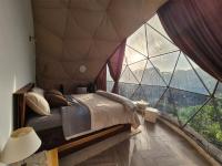 Glamping Monteverdeにあるベッド