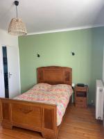Łóżko lub łóżka w pokoju w obiekcie Location maison à Chadron : Haute Loire