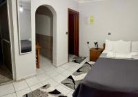 Posteľ alebo postele v izbe v ubytovaní Guesthouse Tsoka