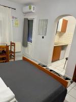 Posteľ alebo postele v izbe v ubytovaní Guesthouse Tsoka