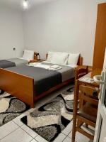 Posteľ alebo postele v izbe v ubytovaní Guesthouse Tsoka