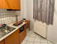 Kuchyňa alebo kuchynka v ubytovaní Guesthouse Tsoka