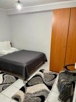 Posteľ alebo postele v izbe v ubytovaní Guesthouse Tsoka