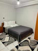 Posteľ alebo postele v izbe v ubytovaní Guesthouse Tsoka