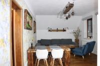 Posezení v ubytování Apartmán Refrino na jedinečném místě
