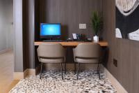 SpringHill Suites by Marriott San Antonio Northwest at The RIMにあるテレビまたはエンターテインメントセンター