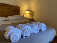 A bed or beds in a room at Antica corte Navigli-Darsena