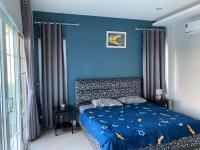 Postel nebo postele na pokoji v ubytování Aurora Pool Villa Cha-am