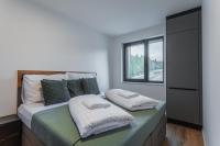 Postel nebo postele na pokoji v ubytování Residence Krušec