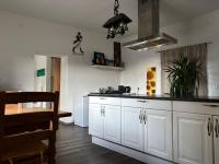 Kuchyň nebo kuchyňský kout v ubytování Auern Apartement