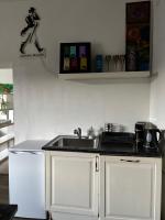 Kuchyň nebo kuchyňský kout v ubytování Auern Apartement