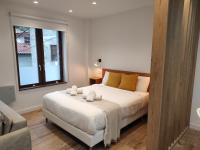 Postel nebo postele na pokoji v ubytování Apartamentos la Garita - El Taller - Cudillero
