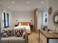 Postel nebo postele na pokoji v ubytování Apartamentos la Garita - El Taller - Cudillero