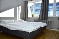 Postel nebo postele na pokoji v ubytování Forenom Serviced Apartments Oslo Rosenborg