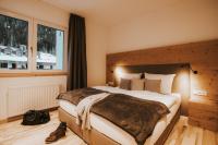 Posteľ alebo postele v izbe v ubytovaní Murrmel Apartments