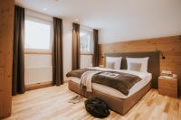 Posteľ alebo postele v izbe v ubytovaní Murrmel Apartments