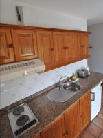 Kuchyňa alebo kuchynka v ubytovaní Apartamentos Atlantis