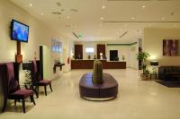 Holiday Bahrain Hotelにあるテレビまたはエンターテインメントセンター