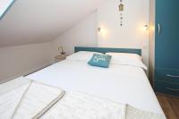 Postel nebo postele na pokoji v ubytování Apartments Silvija Cubranic