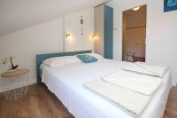 Postel nebo postele na pokoji v ubytování Apartments Silvija Cubranic