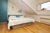 Postel nebo postele na pokoji v ubytování Apartments Silvija Cubranic