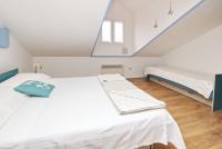 Postel nebo postele na pokoji v ubytování Apartments Silvija Cubranic