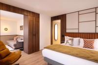 Hôtel 56 - Bordeaux Centre Gare Saint Jeanにあるベッド