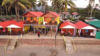 an aerial view of a resort with houses and tables at Nana&#39;s Nook in Agonda