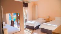 Łóżko lub łóżka w pokoju w obiekcie Belle villa provençale avec piscine privée