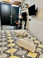 Televízia a/alebo spoločenská miestnosť v ubytovaní Toledo Sweet House