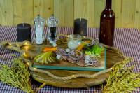 a table with a plate of food on top of a table at Teutsche Schule in Schleusingen